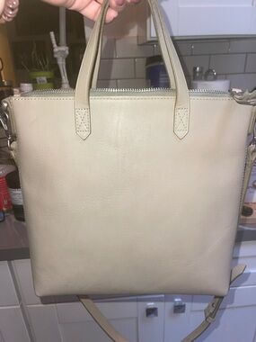 Madewell Zip-top transport crossbody in natural buff.